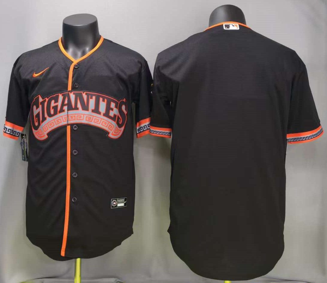 Black San Diego Giants baseball jersey shown on mannequins from the front and back, featuring orange trim, a large 'GIANTES' logo across the chest, and a visible Nike swoosh.